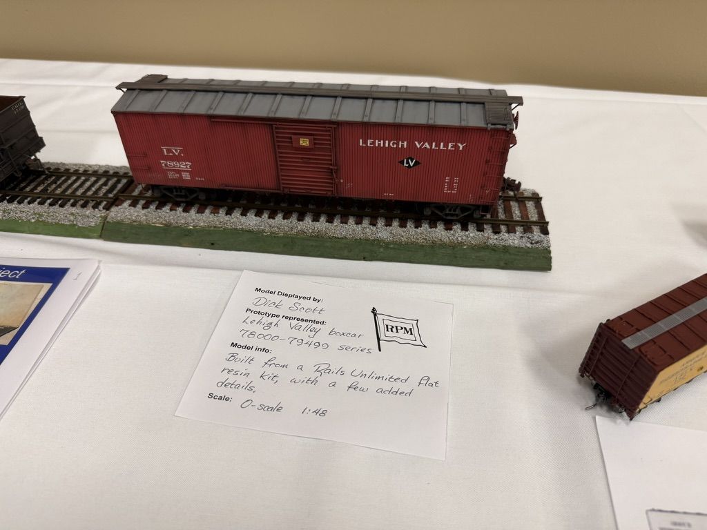 Red O-scale Lehigh Valley boxcar on display track