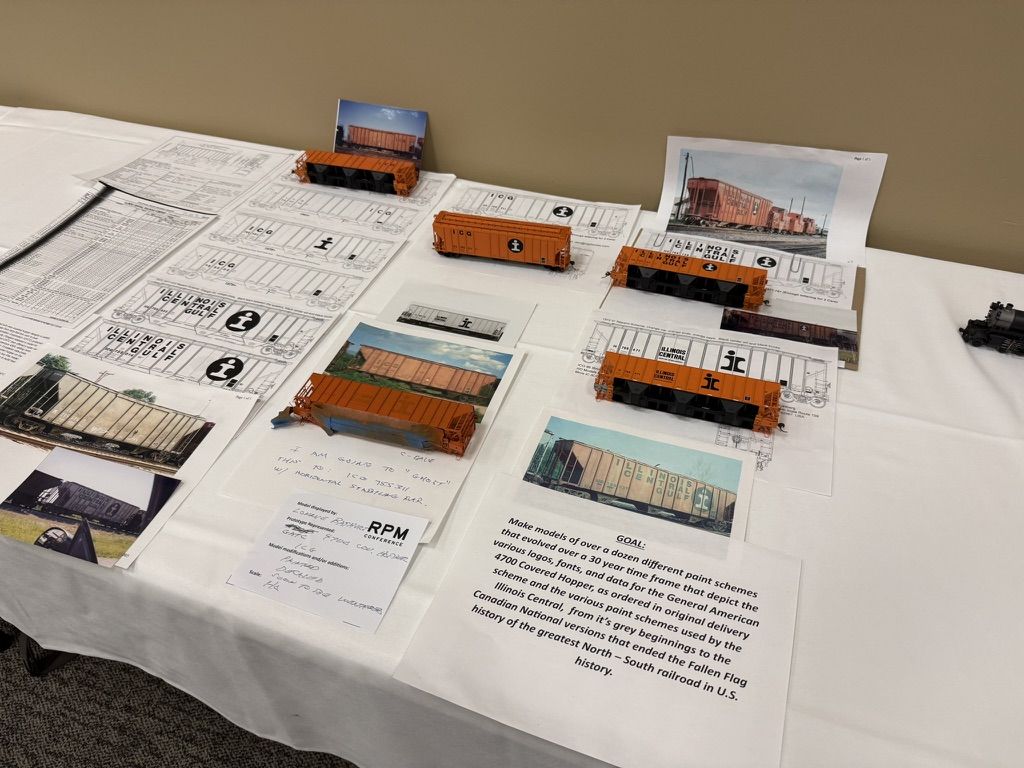 Orange covered hoppers with photos and drawings